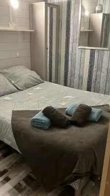 Un ou plusieurs lits dans un hébergement de l'établissement Chalet T3 15 min plage grande terasse et piscine