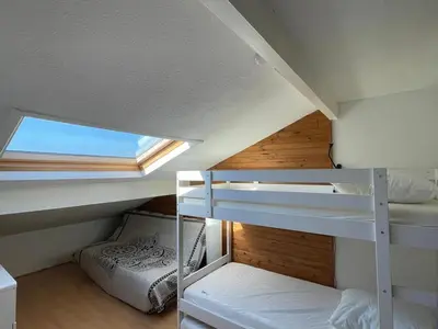 Un ou plusieurs lits dans un hébergement de l'établissement Duplex T2 avec Piscine à Capbreton proche Plage - FR-1-413-250