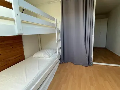 Un ou plusieurs lits dans un hébergement de l'établissement Duplex T2 avec Piscine à Capbreton proche Plage - FR-1-413-250