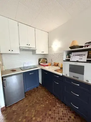 Cuisine ou kitchenette dans l'établissement La belle onde