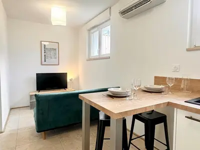 Cuisine ou kitchenette dans l'établissement L'Esplanade - Confort & Lumineux
