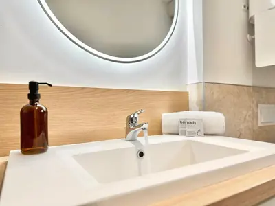 Salle de bains dans l'établissement Le Beausoleil - Confort - Central