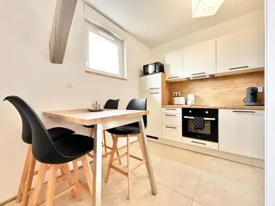 Cuisine ou kitchenette dans l'établissement Le Ronsard - Élégance - Central