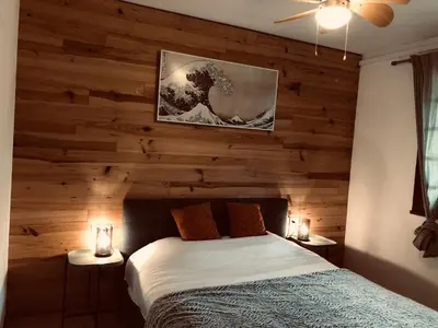 Un ou plusieurs lits dans un hébergement de l'établissement LE DROP IN - T2 au RDC avec terrasse à 200m de la plage - Well located apartment for surfers