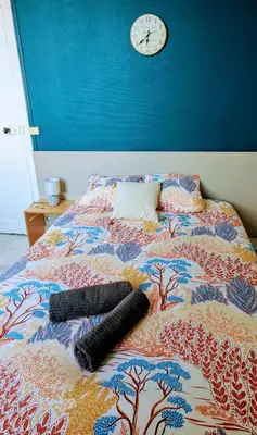 Un ou plusieurs lits dans un hébergement de l'établissement La Villa Oscar en plein cœur de ville