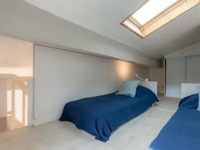 Un ou plusieurs lits dans un hébergement de l'établissement Holiday Home Paradise Océan-16 by Interhome