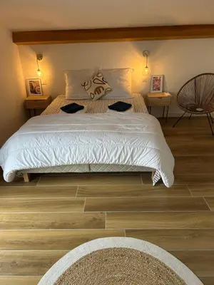 Un ou plusieurs lits dans un hébergement de l'établissement Villa Emma