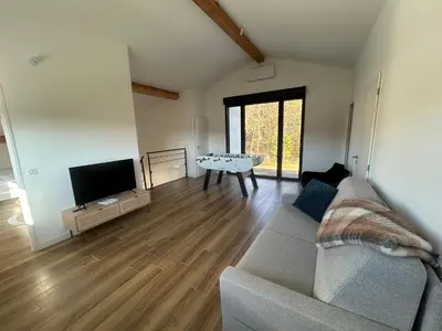 Télévision ou salle de divertissement dans l'établissement Villa Emma