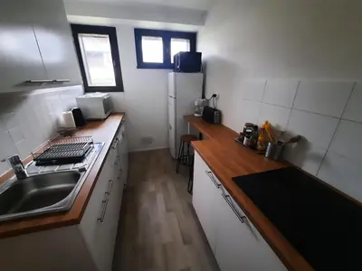 Cuisine ou kitchenette dans l'établissement Appartement Spacieux à Seignosse, Terrasse et Parking, à Proximité de la Plage - FR-1-239-401