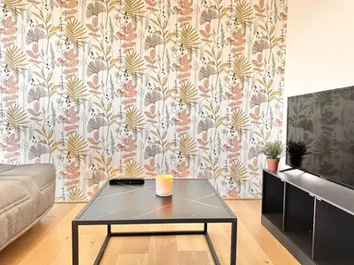 Télévision ou salle de divertissement dans l'établissement L'Harmonie Marbrée - Convivial - Parking Privé - Calme