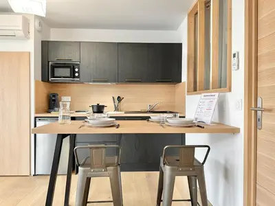 Cuisine ou kitchenette dans l'établissement Au Cœur de la Médina - Centre Ville - Parking