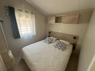 Un ou plusieurs lits dans un hébergement de l'établissement Cottage Prestige 641