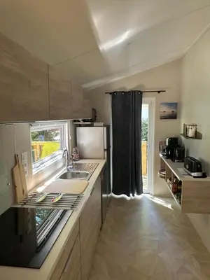 Cuisine ou kitchenette dans l'établissement Cottage Prestige 641