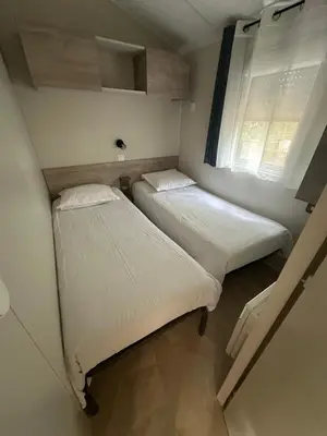 Un ou plusieurs lits dans un hébergement de l'établissement Cottage Prestige 641
