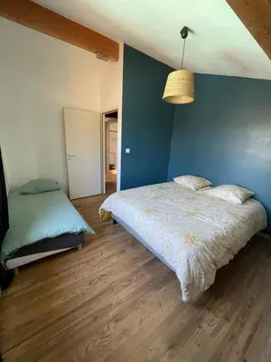 Un ou plusieurs lits dans un hébergement de l'établissement Le Chalet de Nino