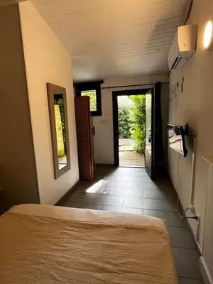 Un ou plusieurs lits dans un hébergement de l'établissement Hotel Cote et Lac