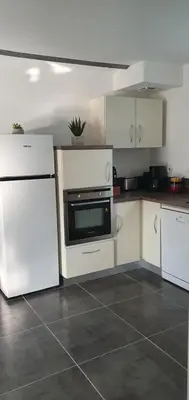 Cuisine ou kitchenette dans l'établissement La Renardière