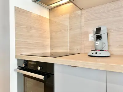 Cuisine ou kitchenette dans l'établissement Le Reflet Doré - Familial - Spacieux - Central
