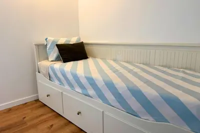 Un ou plusieurs lits dans un hébergement de l'établissement Le Cottage Détente
