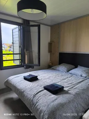 Un ou plusieurs lits dans un hébergement de l'établissement cottage Landes entre terre et ocean