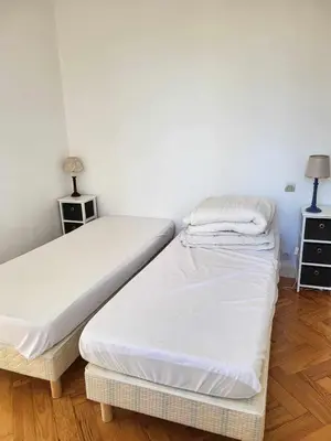 Un ou plusieurs lits dans un hébergement de l'établissement Appartement proche du lac d'Hossegor