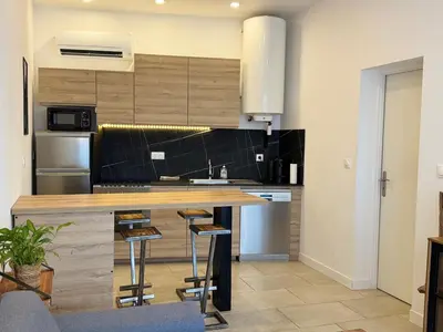 Cuisine ou kitchenette dans l'établissement Le Repos des Pins, à 10 minutes des plages