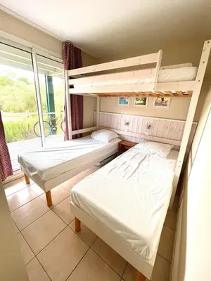 Un ou plusieurs lits dans un hébergement de l'établissement Appartement en résidence