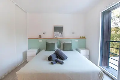 Un ou plusieurs lits dans un hébergement de l'établissement La Villa Canopée du Lac