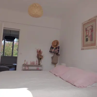 Un ou plusieurs lits dans un hébergement de l'établissement Maison Peonia