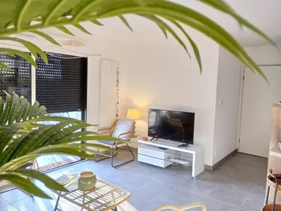 Télévision ou salle de divertissement dans l'établissement Henea