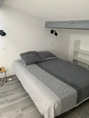 Un ou plusieurs lits dans un hébergement de l'établissement Studio Tuco