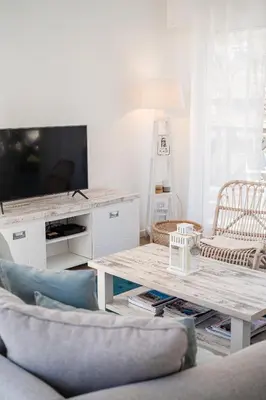 Télévision ou salle de divertissement dans l'établissement Villa Ocean