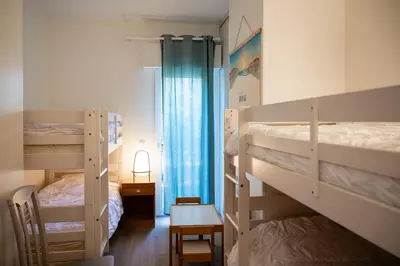 Un ou plusieurs lits dans un hébergement de l'établissement Villa Ocean