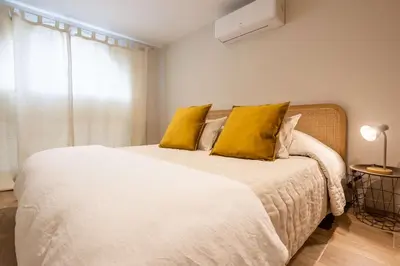 Un ou plusieurs lits dans un hébergement de l'établissement Magnifique Appartement Biscarrosse Bourg