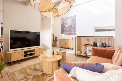 Télévision ou salle de divertissement dans l'établissement Magnifique Appartement Biscarrosse Bourg