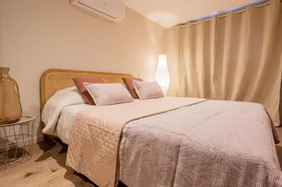 Un ou plusieurs lits dans un hébergement de l'établissement Magnifique Appartement Biscarrosse Bourg