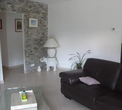 Coin salon dans l'établissement La Palibe