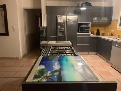 Cuisine ou kitchenette dans l'établissement Chambre de détente