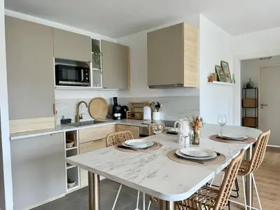 Cuisine ou kitchenette dans l'établissement Joli Appartement avec terrasse Bassin d'Arcachon