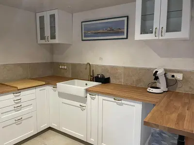 Cuisine ou kitchenette dans l'établissement Duplex rénové au cœur de la nature
