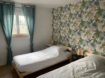 Un ou plusieurs lits dans un hébergement de l'établissement Duplex rénové au cœur de la nature