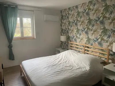 Un ou plusieurs lits dans un hébergement de l'établissement Duplex rénové au cœur de la nature