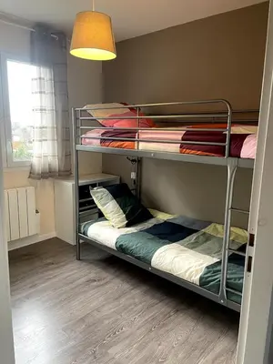Un ou plusieurs lits dans un hébergement de l'établissement La maison de CASTETS entre forêt et océan