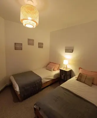 Un ou plusieurs lits dans un hébergement de l'établissement Bel appartement hyper centre