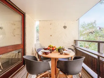 Coin salon dans l'établissement Apartment Pyrénées by Interhome