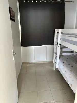 Un ou plusieurs lits dans un hébergement de l'établissement Charmante villa