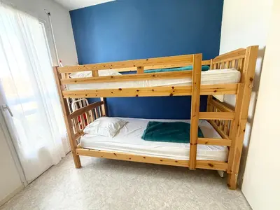 Un ou plusieurs lits dans un hébergement de l'établissement Douceur Océane Terrasse & Balcon