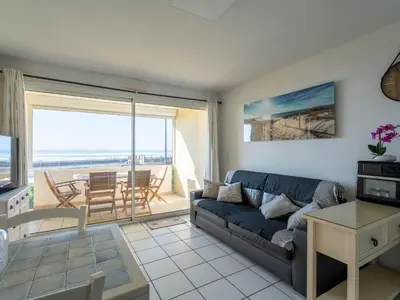 Coin salon dans l'établissement Appartement 6 pers., vue océan, Mimizan Plage, parking - FR-1-50-158