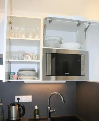 Cuisine ou kitchenette dans l'établissement Ambiance Cosy Capbreton