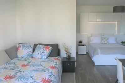 Un ou plusieurs lits dans un hébergement de l'établissement Ambiance Cosy Capbreton